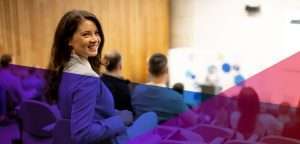 A woman attending a business presentation